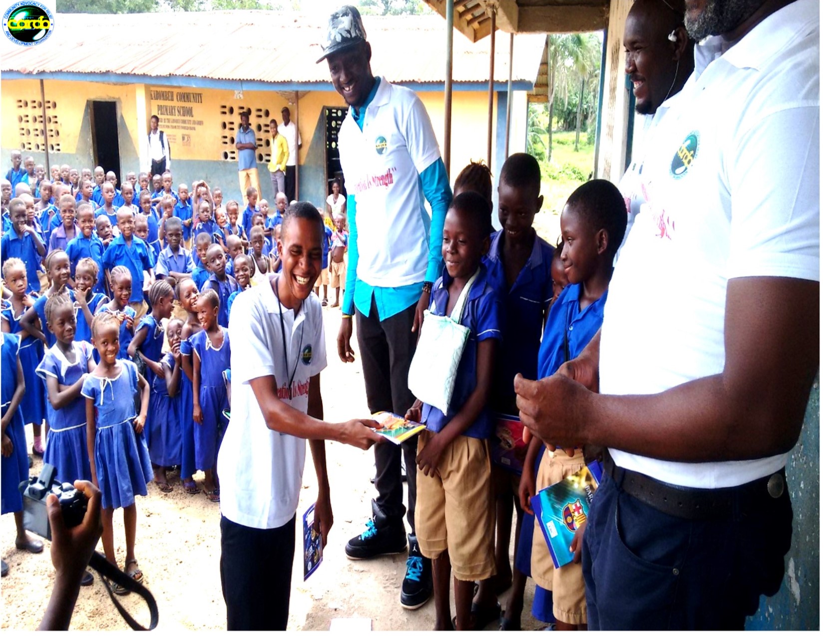 CARDO DONATING TO PUPILS AT KABOMBEH SCHOOL